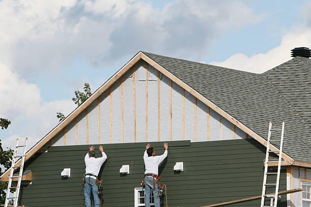 Professional Siding Repair technician working in Wharton, TX